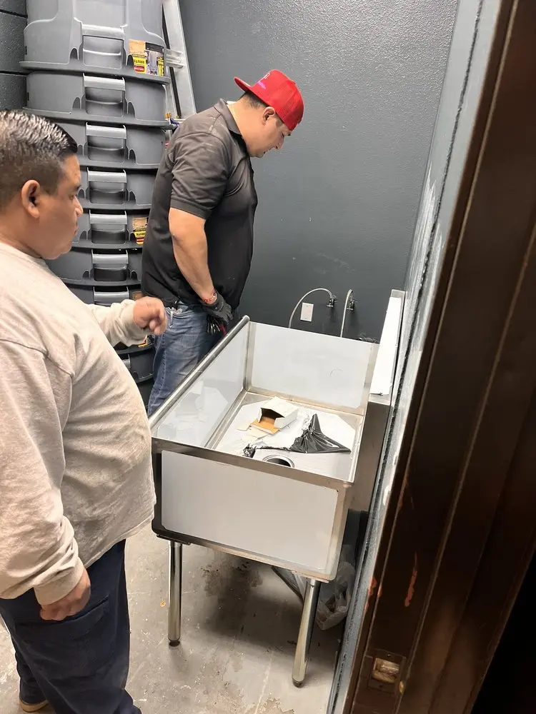 Commercial plumbing and sink installation in Elm